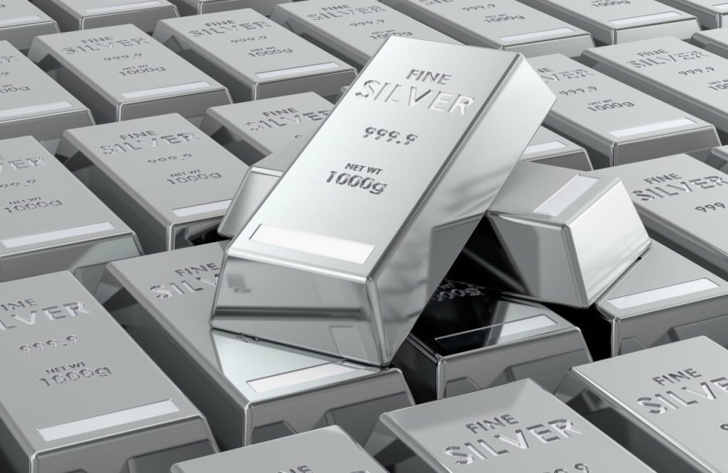 Silver falls as much as 13% as the volatility continues in metals