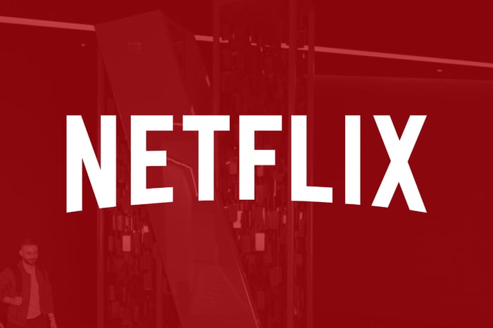 If I Had $5,000 to Invest Today, Here’s the Growth Stock I’d Buy Instead of SpaceX The Netflix logo on a translucent red background.