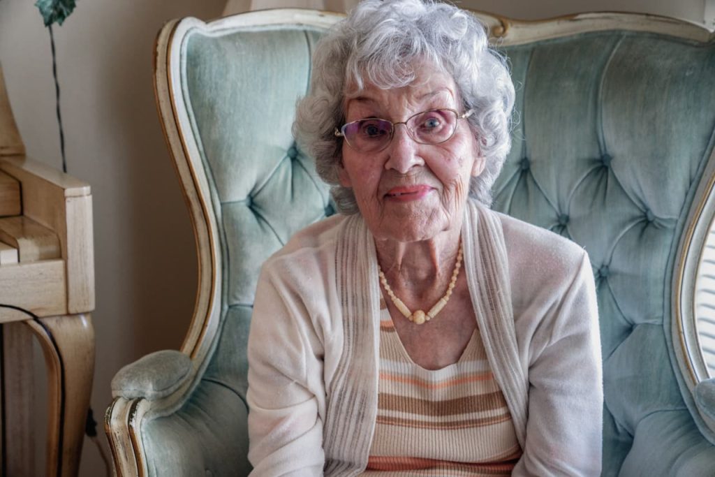 My mother, 91, has dementia. Every bank says I need her signature to unlock her $100,000 stock certificate. What can I do?